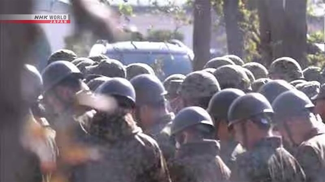 Сухопутные Cилы самообороны Японии тренируются отлавливать медведей в префектуре Акита